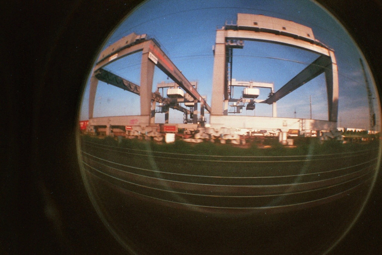I bought a Lomo Fisheye cam. It’s fun! :-)
