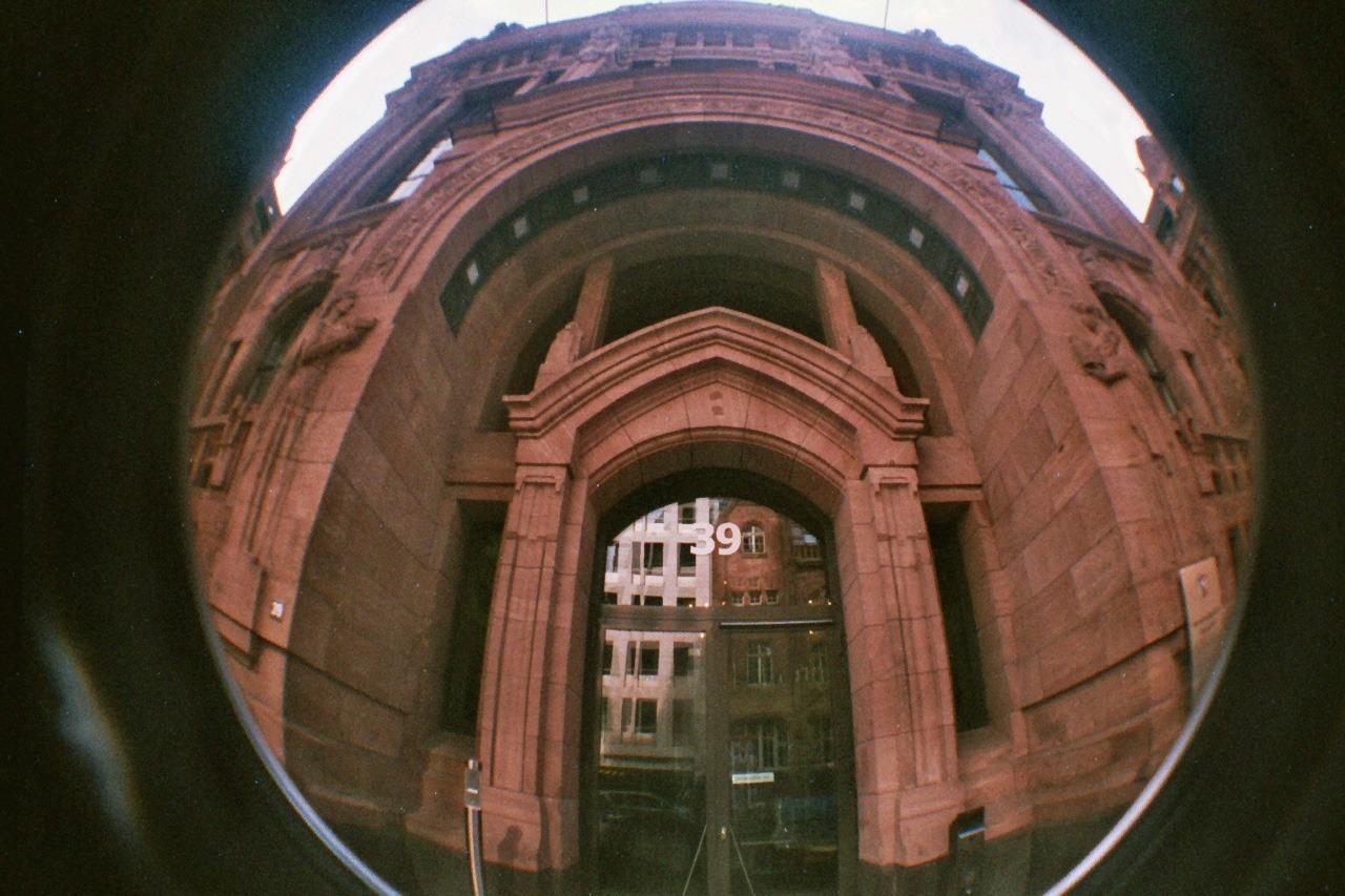 I bought a Lomo Fisheye cam. It’s fun! :-)